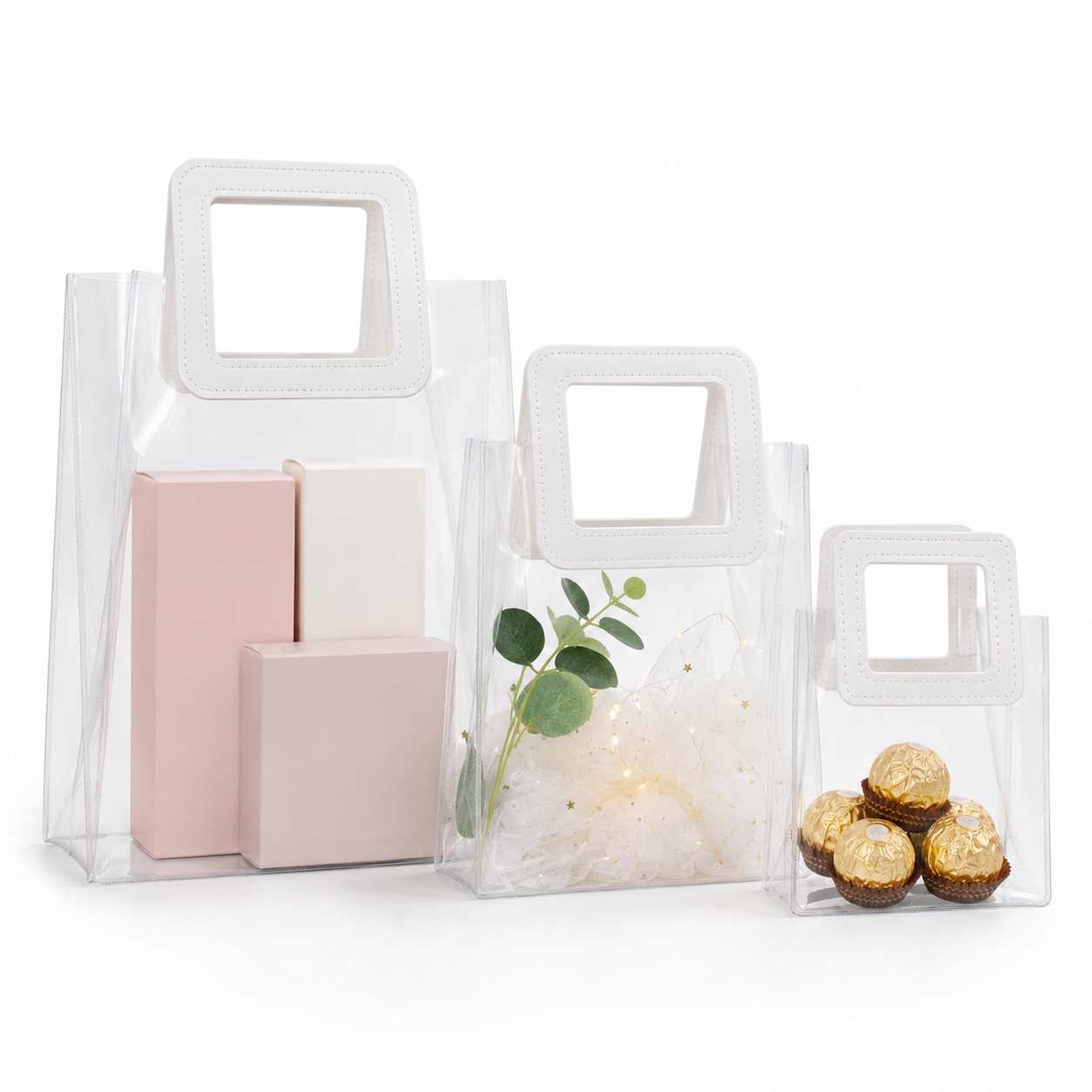 Clear PVC Gift Bags with Handles – 3 Sizes Clear PVC Gift Bags with Handles in three sizes for flowers, candy, cosmetics and retail gift packaging