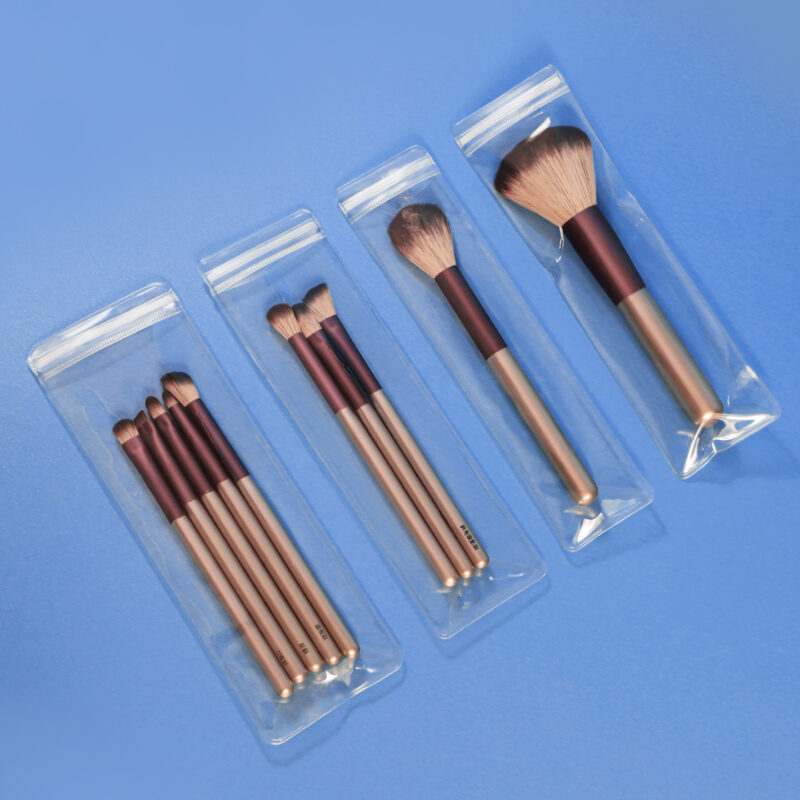 Multiple sizes of long clear PVC ziplock pouches for cosmetic brushes and makeup accessories