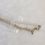 Waterproof test with water droplets on clear PVC necklace display budding bags