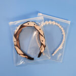 High transparency clear EVA zipper bags perfectly protecting a pearl headband.