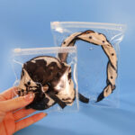Waterproof performance test of our clear EVA zipper bags showing water droplets on the surface.