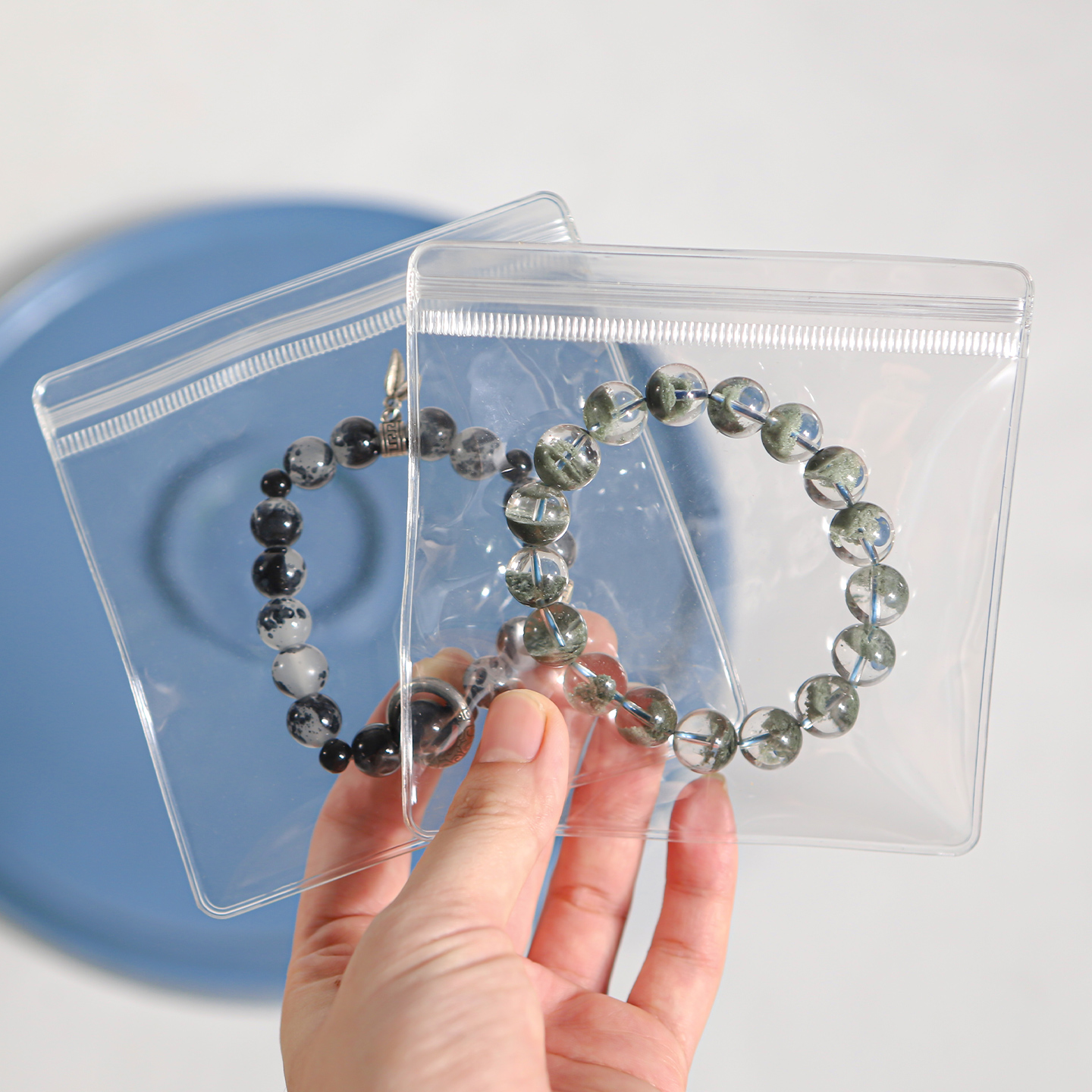 Clear PVC ziplock bags for bracelet packaging with transparent film and resealable zipper closure.