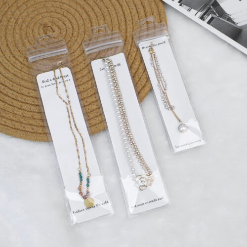 Long PVC Ziplock Bags for necklace packaging with hanging hole and clear retail display pouch.
