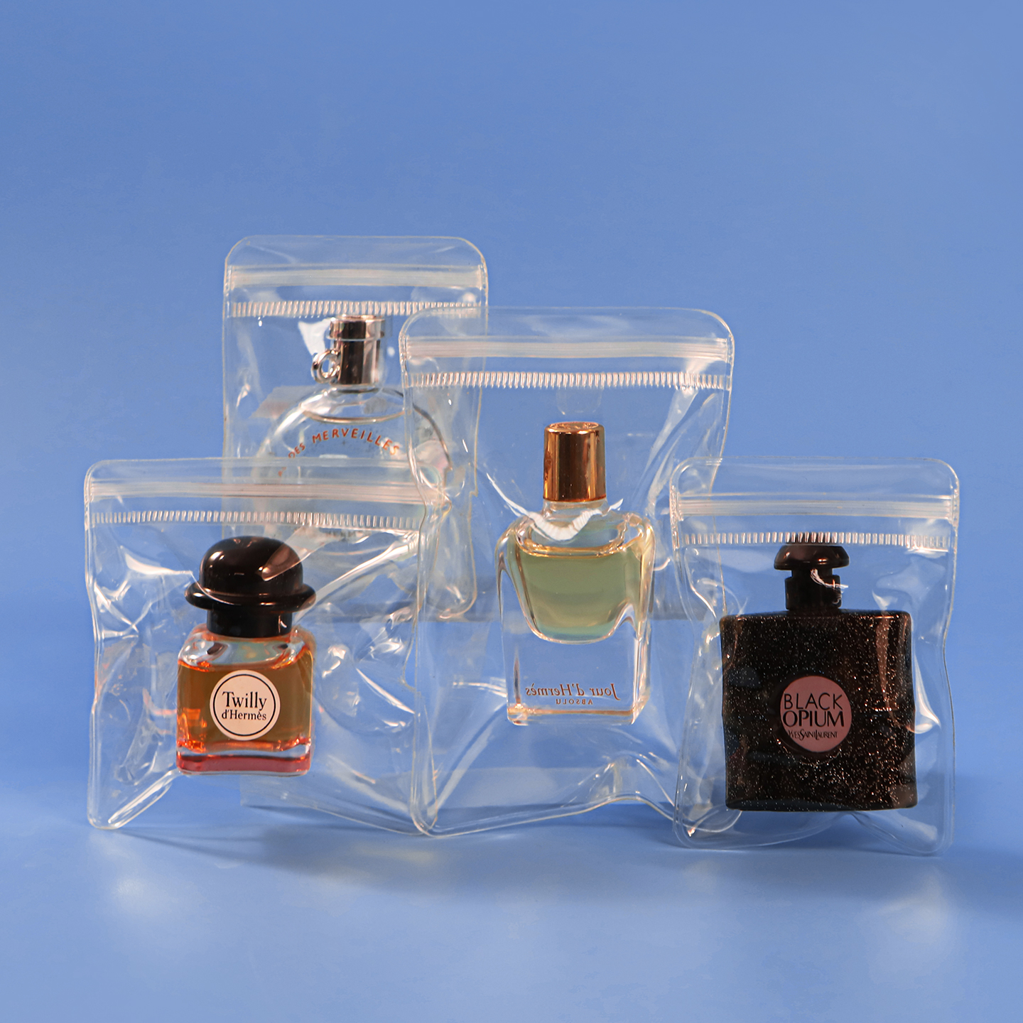 Clear cosmetic packaging bags in multiple sizes for perfume bottles and beauty products