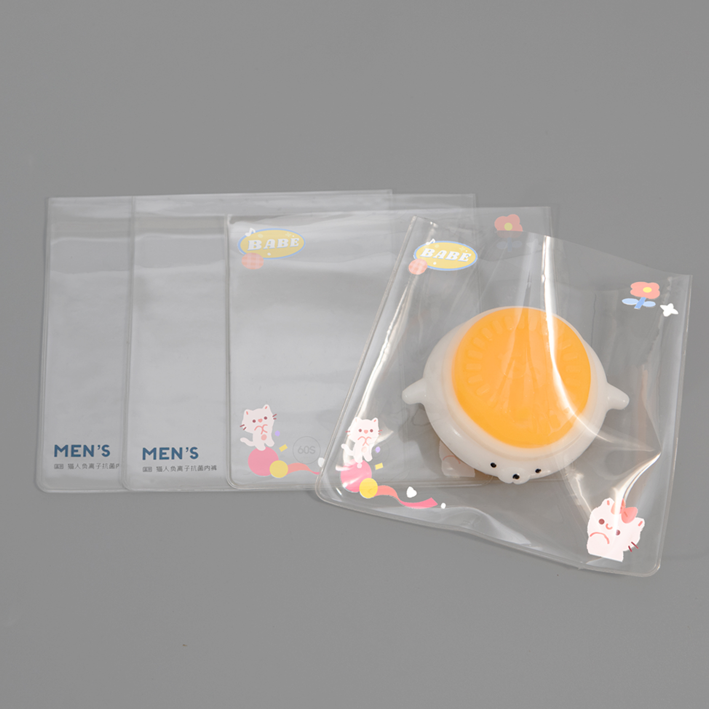 Custom printed plastic bags featuring colorful designs, logos, and specific text for retail.
