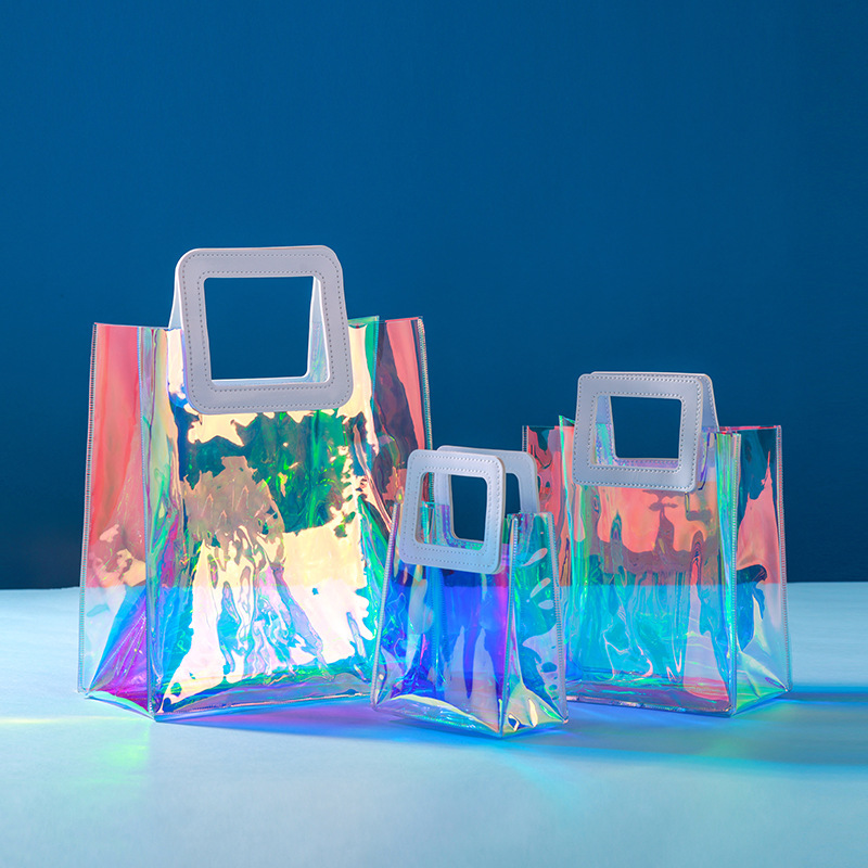 custom holographic PVC tote bags showing rainbow color-shift effect for festival merch