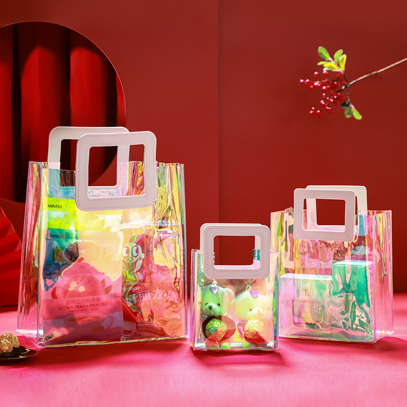Holographic PVC tote bags used for gift-with-purchase promotions and holiday snack packaging