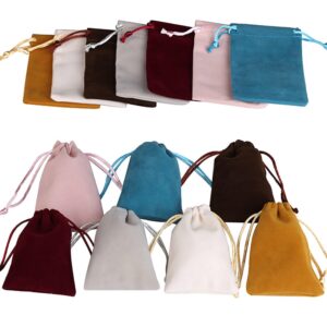 Multiple colors of velvet jewelry drawstring pouches used for luxury gifting and retail counter display.