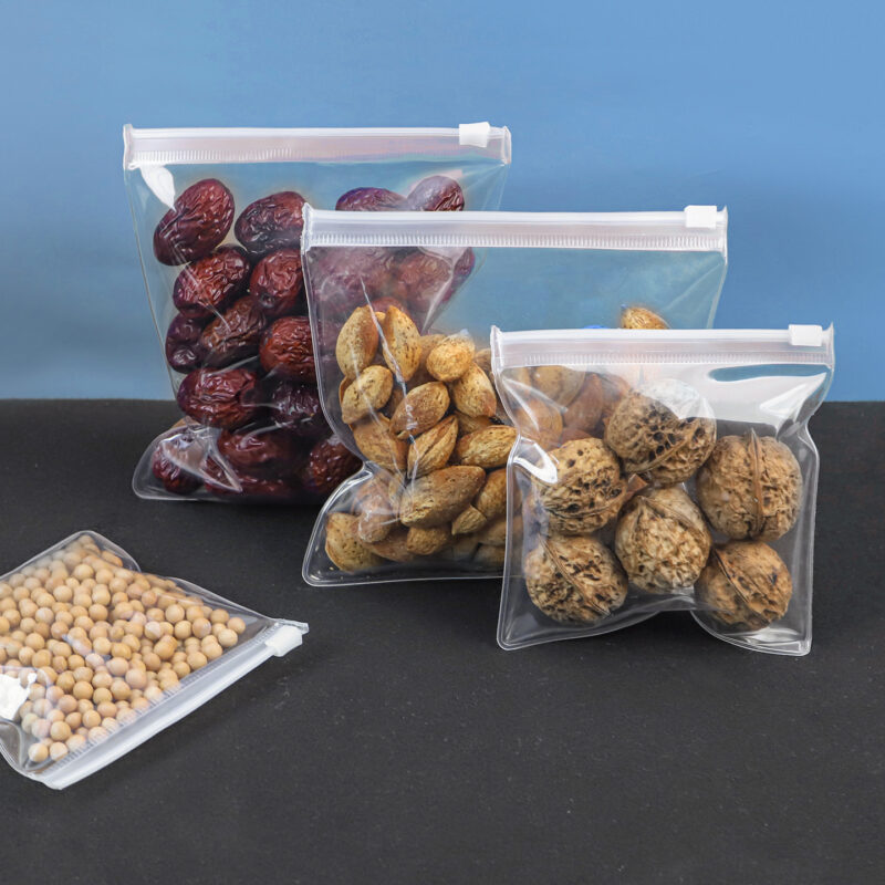 Clear food-grade EVA ziplock bags filled with dry goods like nuts and soybeans, demonstrating high clarity and FDA-compliant food safety.