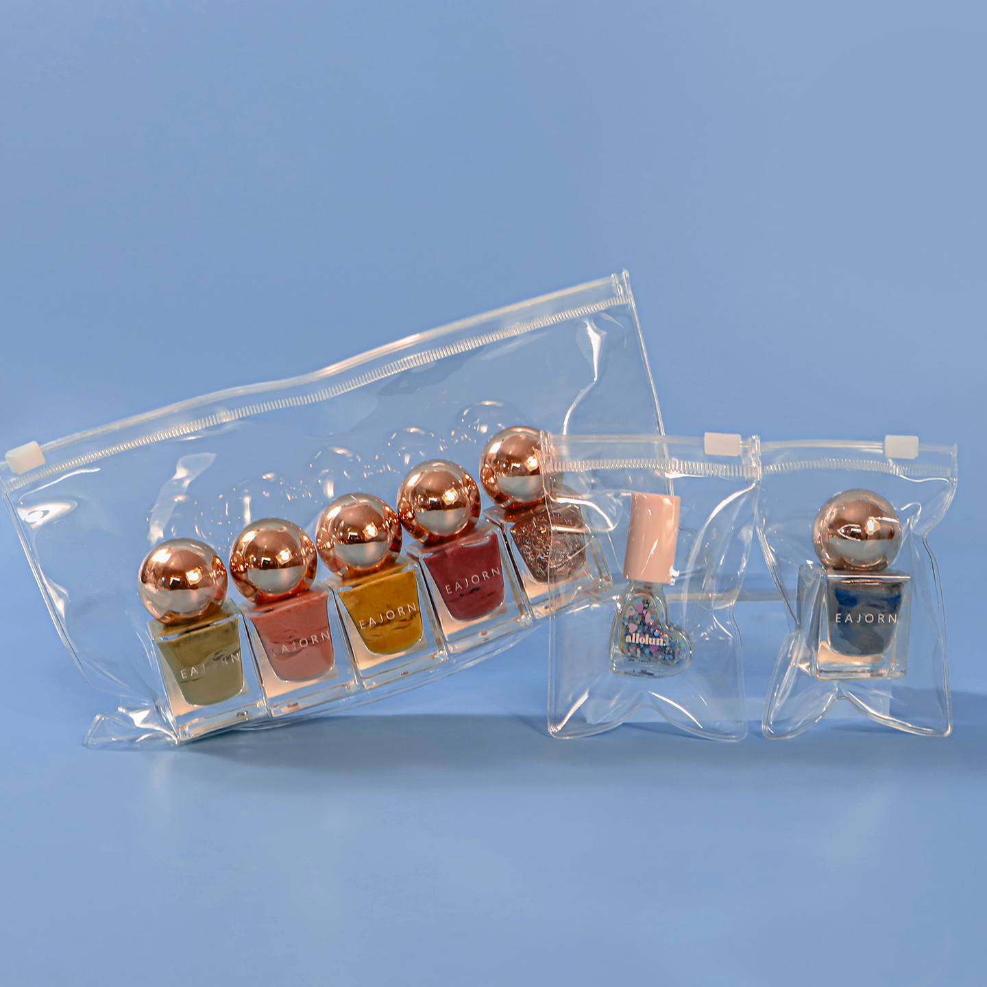 Clear PVC zipper bags showing nail polish shades for cosmetic brands